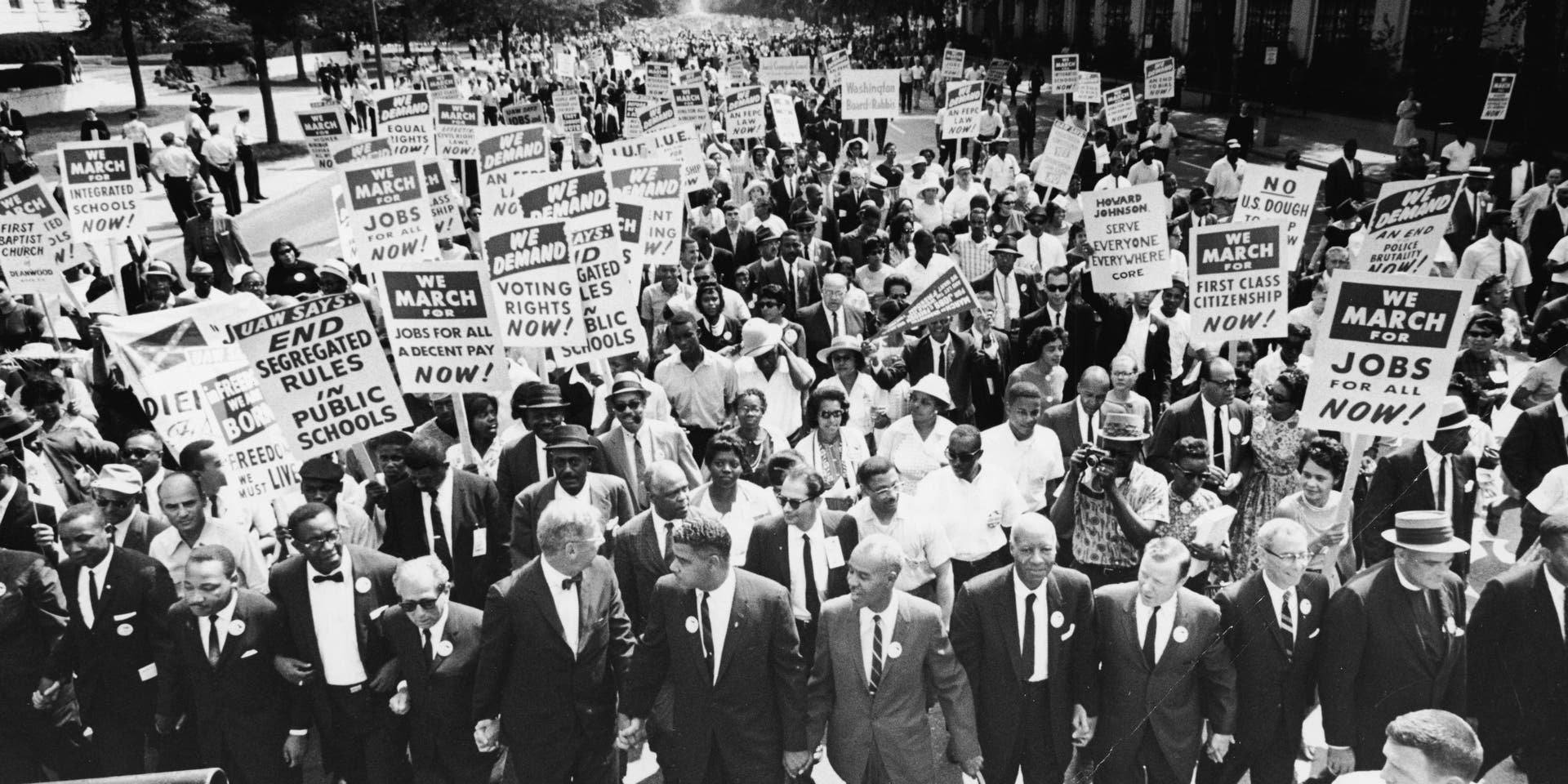 Civil Rights Leaders At The March On WashingtonCivil rights Leaders hold hands as they lead a crowd of hundreds of thousands at the March on Washington for Jobs and Freedom, Washington DC, August 28, 1963. Those in attendance include (front row): James Meredith and Martin Luther King, Jr. (1929 - 1968), left; (L-R) Roy Wilkins (1901 - 1981), light-colored suit, A. Phillip Randolph (1889 - 1979) and Walther Reuther (1907 - 1970). (Photo by Express/Hulton Archive/Getty Images)