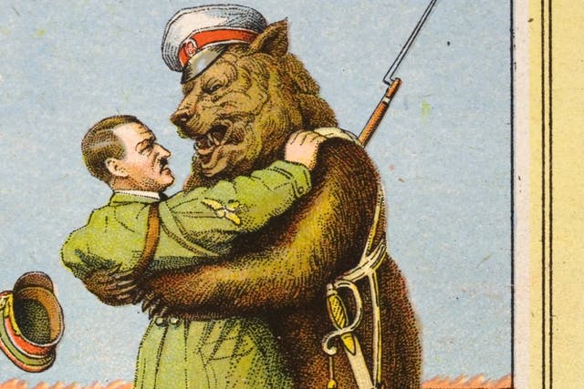 A French political cartoon critiquing the Molotov-Ribbentrop Pact. Hitler and the Russian Bear are wrestling over a map of Russia and the Crimea. (Photo by Michael Nicholson/Corbis via Getty Images)
