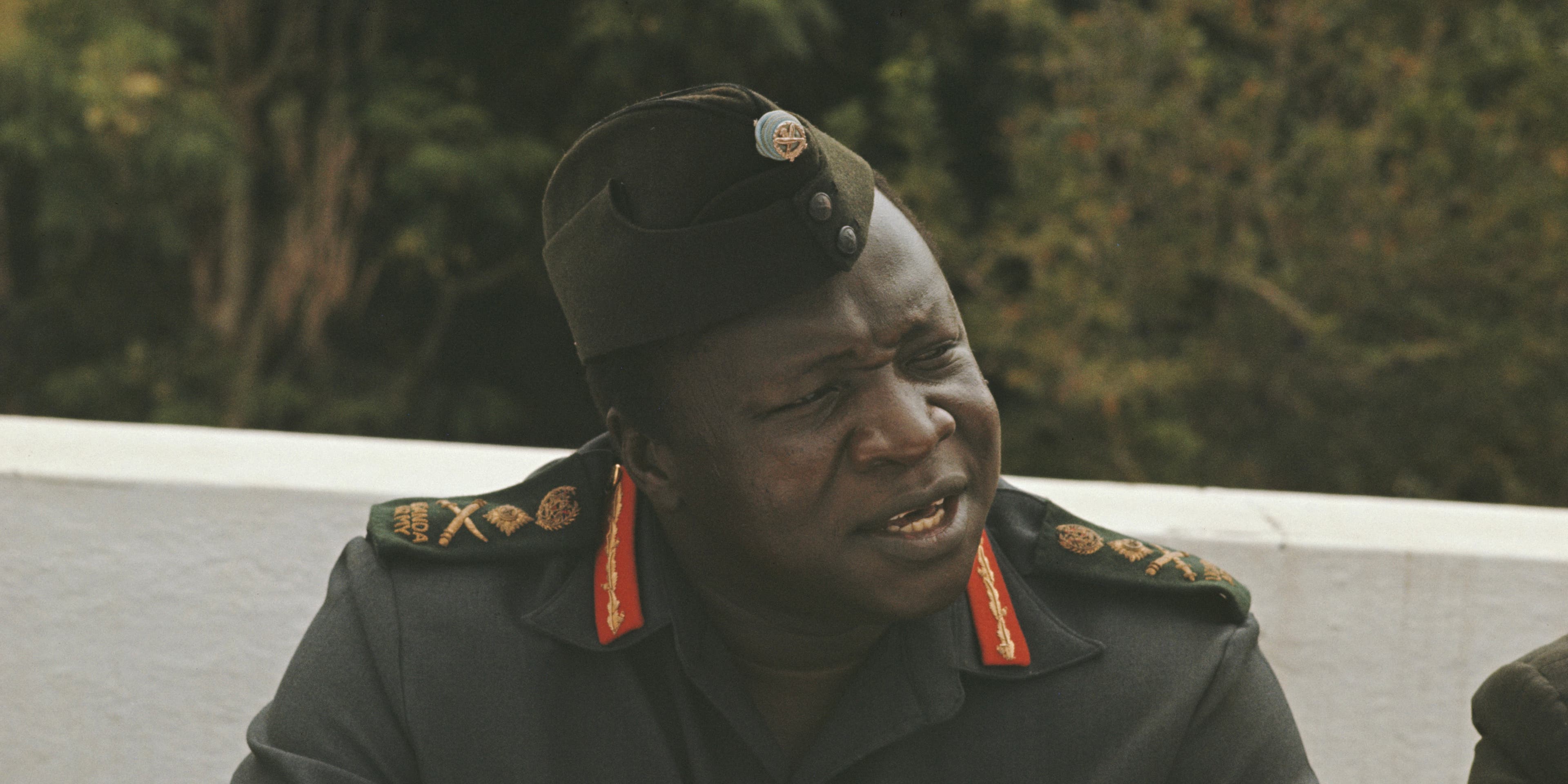 President of Uganda, Idi Amin pictured attending a lunch with British High Commissioner Richard Slater, the Indian High Commissioner, Pakistan's Ambassador and leaders of Uganda's Asian community at his house, known as 'The Command Post' in Kampala, Uganda in August 1972.