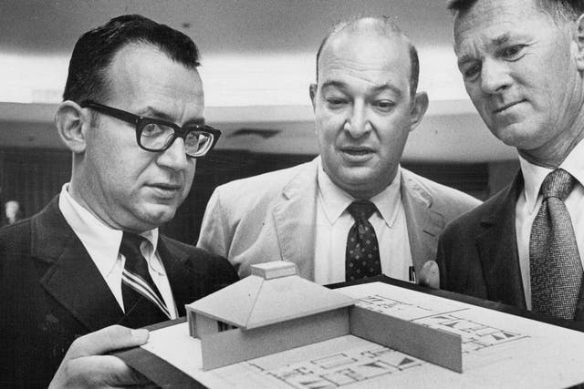 AUG 28 1969 Model Of the Four- Unit Housing Complex is on Display At Coalition Meet Around it are, from left, Charles Henning, Ed Lashman and Warren Shannon.