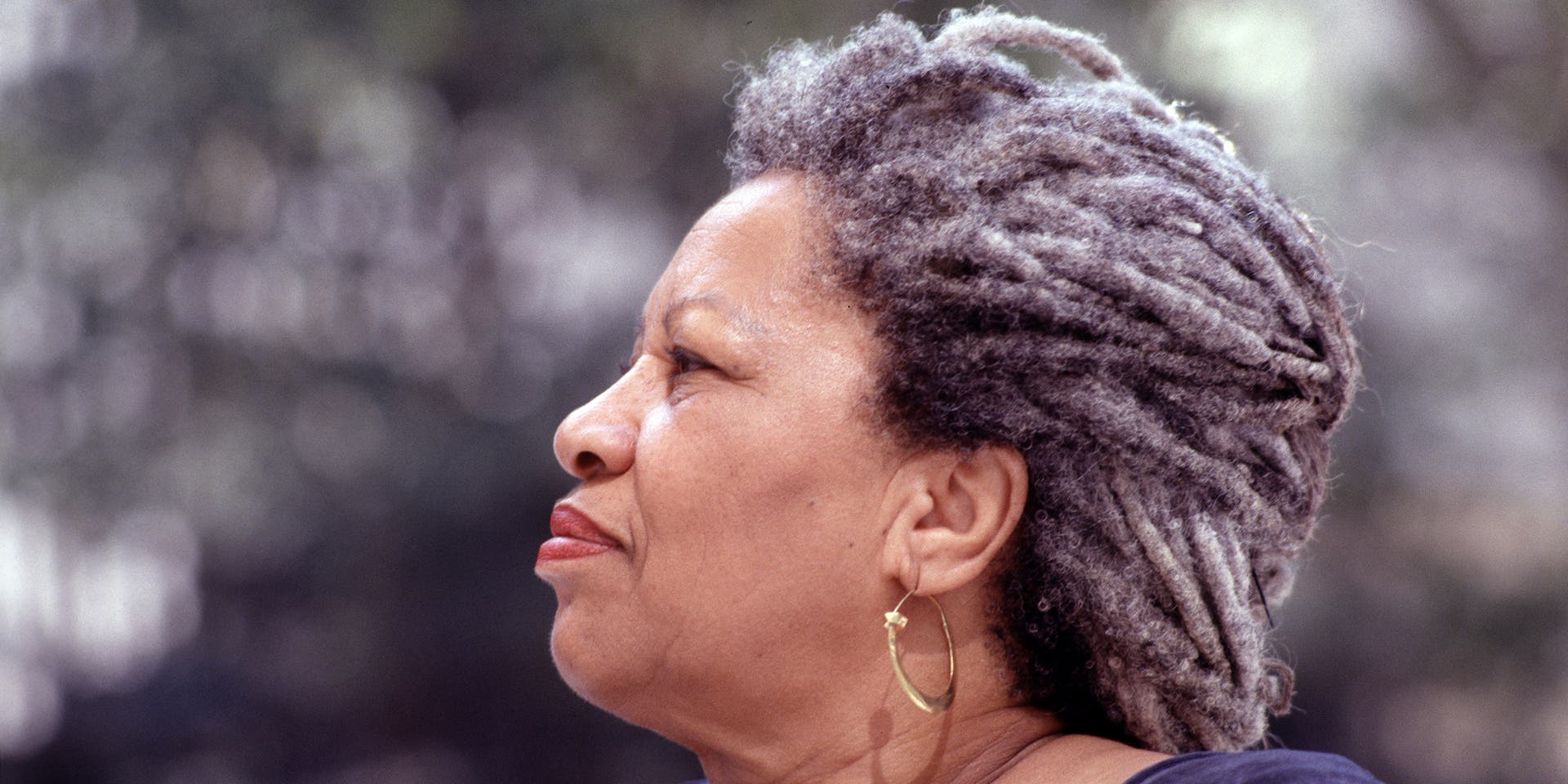 American author and Nobel laureate Toni Morrison (1931 - 2019) reads from her work during an outdoor event at Bryant Park, New York, New York, September 12, 1994.