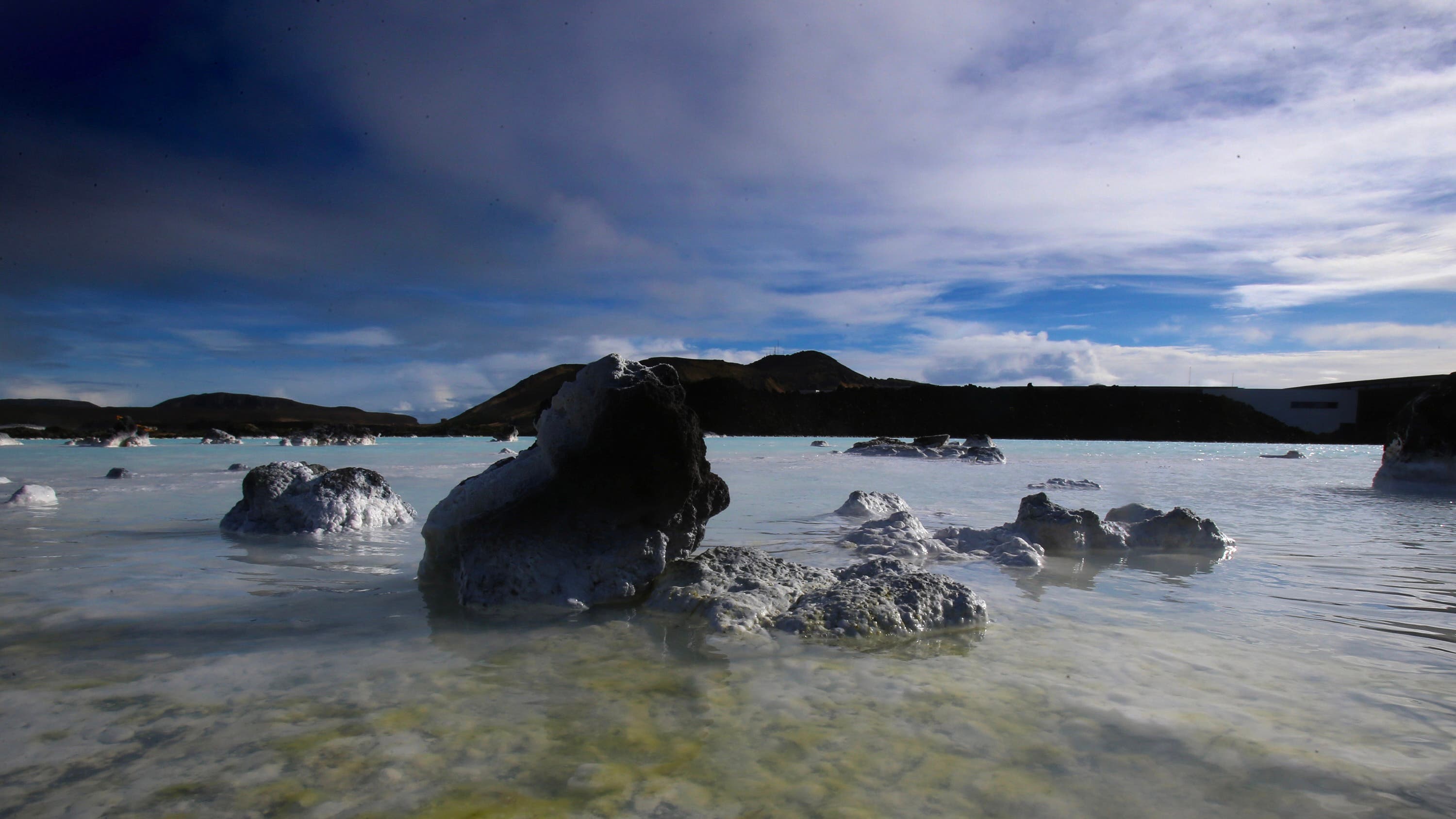 Clouds hover above the surrounding geothermal waters at the Blue Lagoon close to the Icelandic capital on April 7, 2014 in Reykjavik, Iceland.
