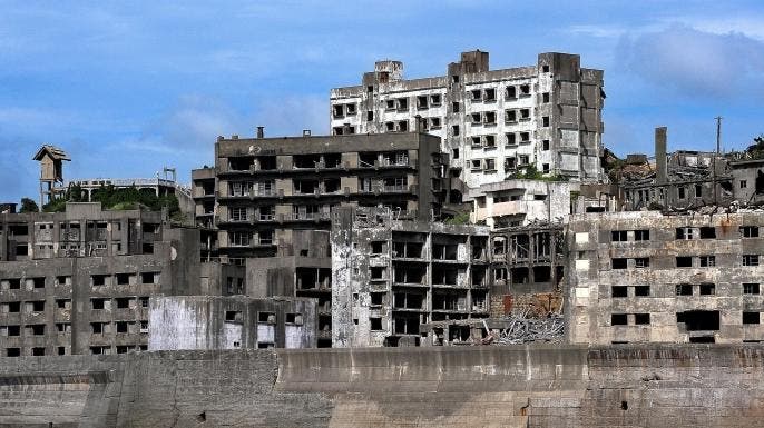 ghost towns definition us history Hashima Island, Japan