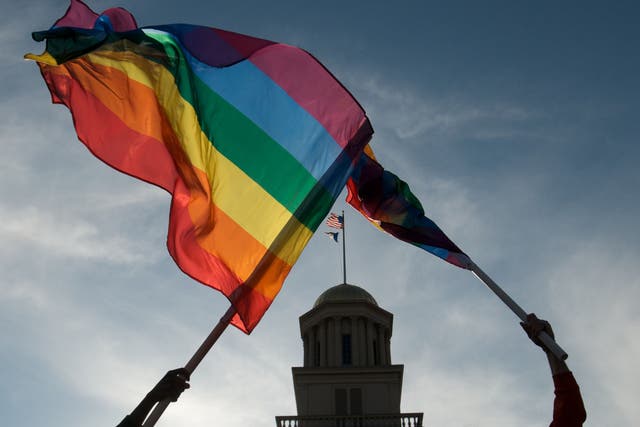 IOWA CITY, IOWA - APRIL 3: Gay, lesbian and transgender activists react to the unanimous decision by the Iowa Supreme Court earlier in the day recognizing same sex marriage as a civil right during a celebration on April 3, 2009 at the University of Iowa in Iowa City, Iowa. (Photo by David Greedy/Getty Images)