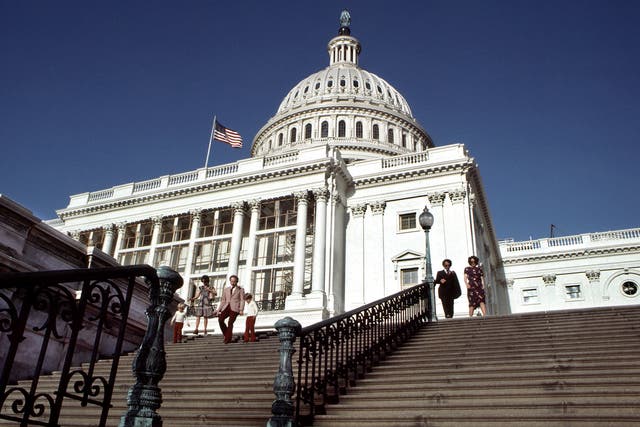 Visitors leave the United States Capitol, the seat of the United States Congress and the legislative branch of the U.S. government, in Washington, D.C.