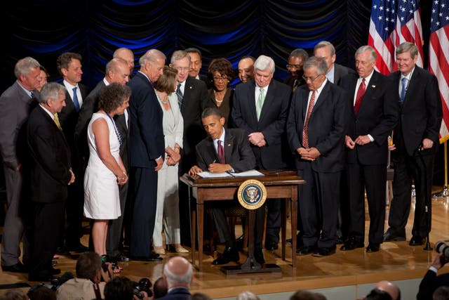 President Barack Obama signs the Dodd-Frank Wall Street Reform and Consumer Protection financial overhaul bill at the Ronald Reagan Building in Washington. Pictured from left to right: Rep. Collin Peterson, D-Minn., Sen. Jack Reed, D-R.I., Sen. Blanche Lincoln, D-Ark., <a href=