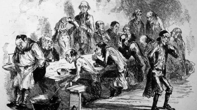 Men sitting down to dinner in the poorhouse, 1840. (Credit: Hulton Archive/Getty Images)