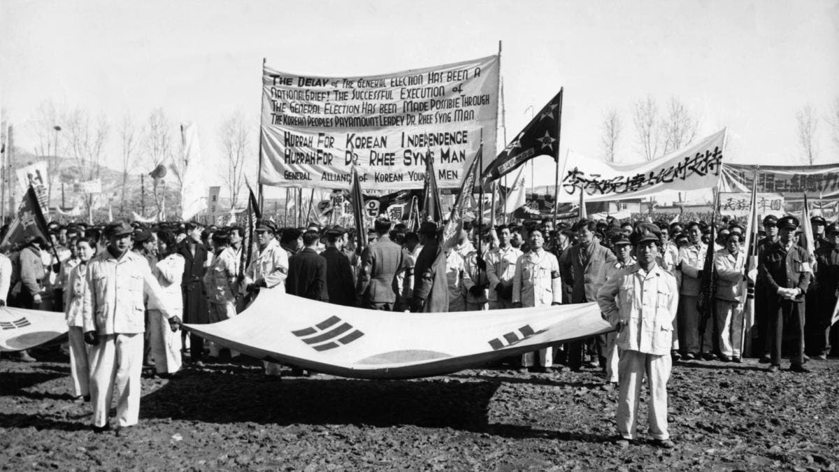 1st March 1948: Some of the 80,000 Koreans gathering in 1948 to commemorate Korea's Declaration of Independence from Japan on March 1, 1919. (Credit: Paul Popper/Popperfoto/Getty Images)