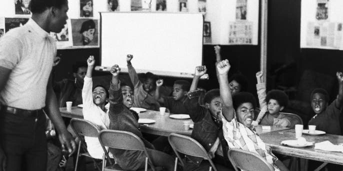 A teacher and his at a Black Panther liberation school. (Credit: Bettmann Archive/Getty Images)
