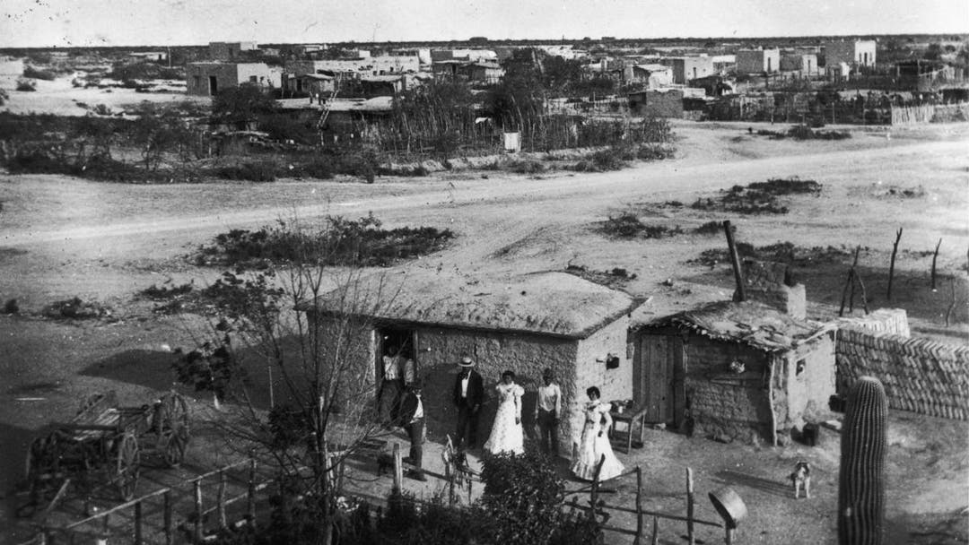 Immigrants outside of their home near the Mexico border in Tucson, Arizona circa 1890. (Credit: Fotosearch/Getty Images)