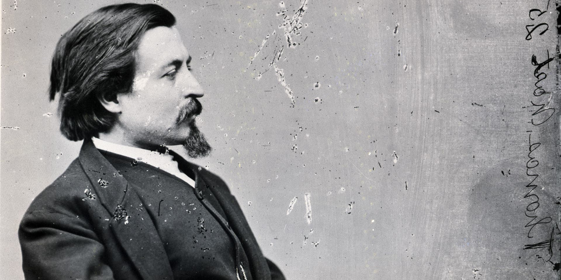 Seated portrait of cartoonist Thomas Nast. Photo by Matthew Brady.